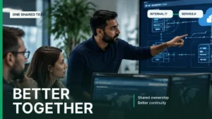 Internal IT and external support professionals collaborating on shared technical operations